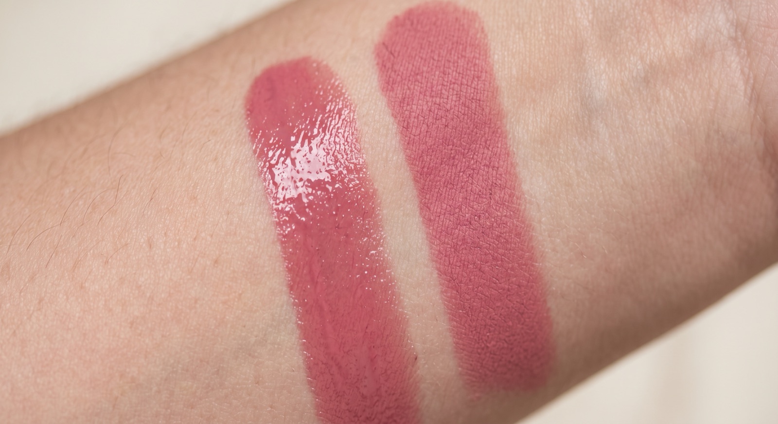The same rose lip colour swatched twice on a forearm: one glossy stroke, one velvet matte stroke